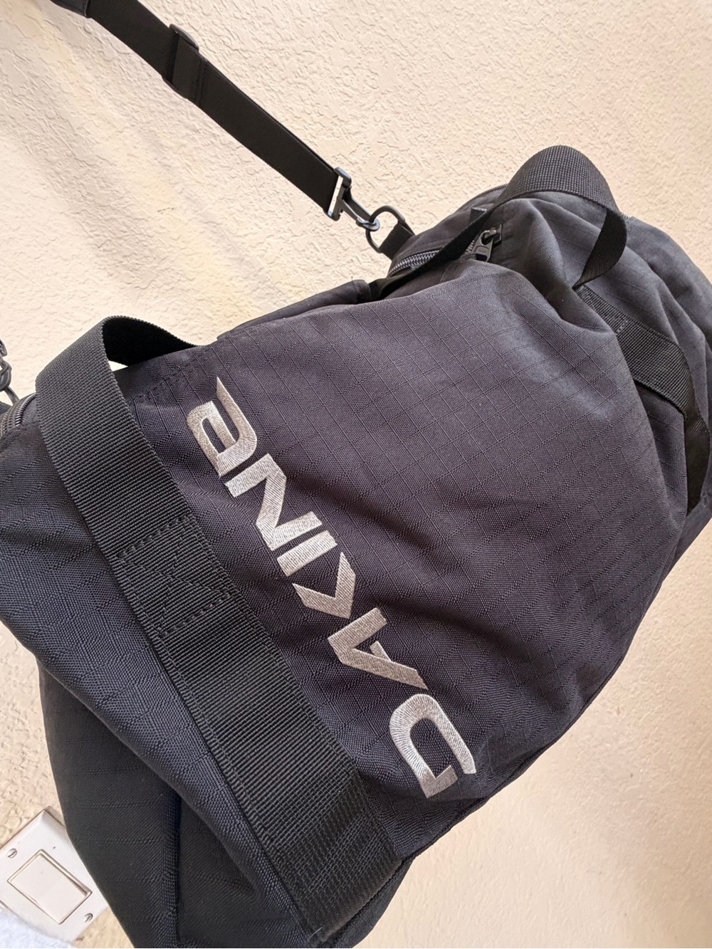 DAKINE Black Men’s Duffel with White Logo
